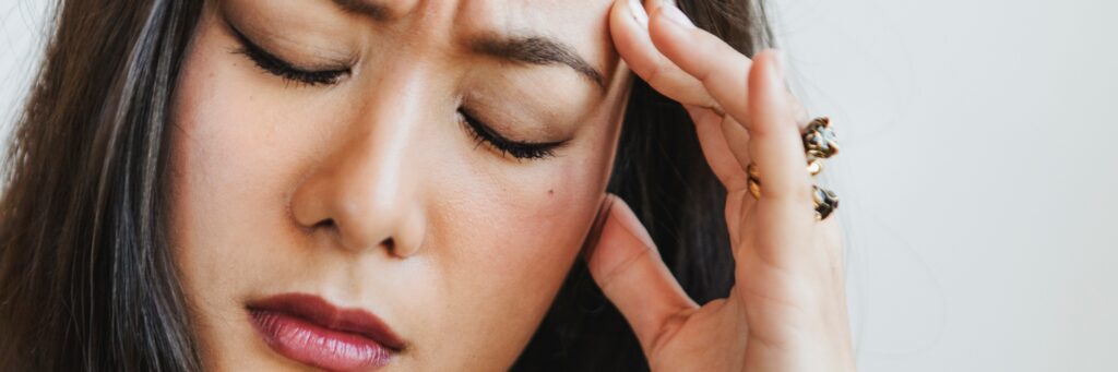 Woman having a bad migraine